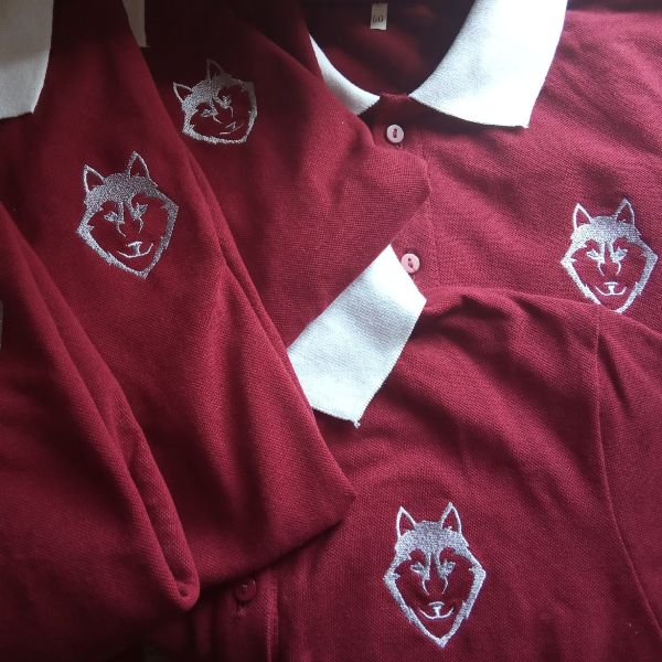 Embroidered leavers' polo with year mark and class name